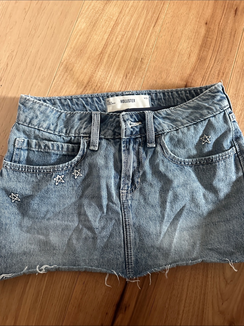 Hollister Light Blue Denim Mini Skirt with Star Accents and built in shorts